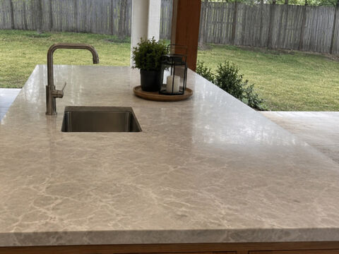 Outdoor kitchen countertop in quartzite with undermount sink